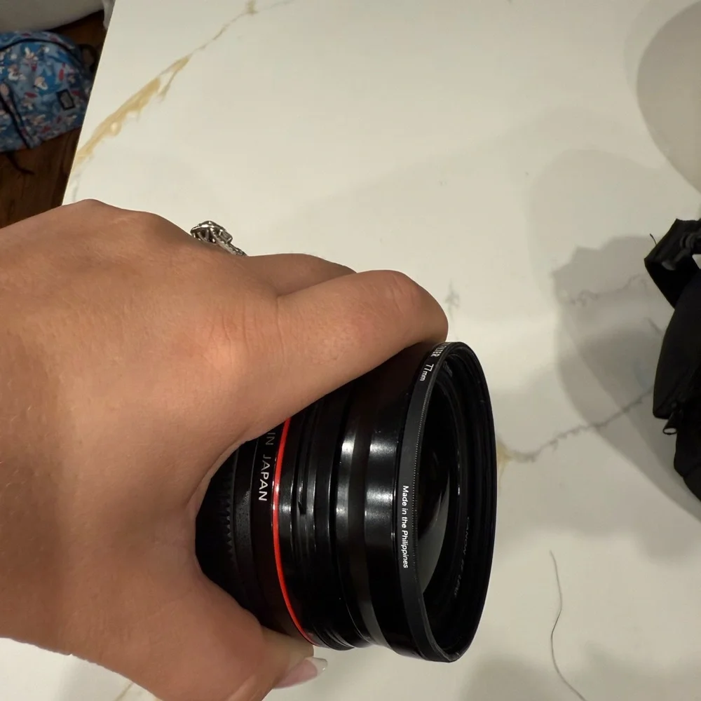 Canon Black and Red Camera Lens